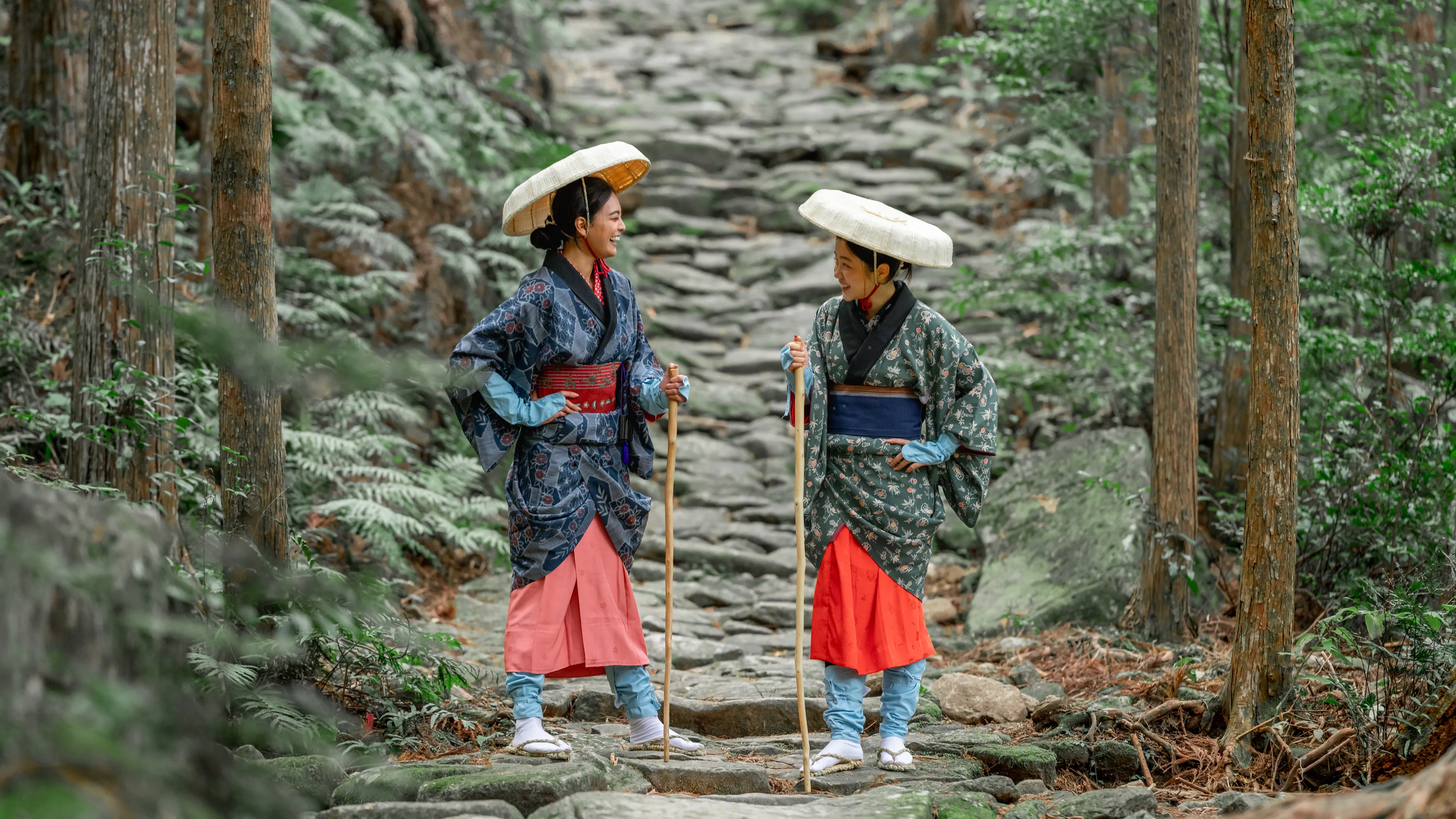 Walk the Magose pass on the Kumano Kodo trail, UNESCO World heritage site, in traditional travel garb